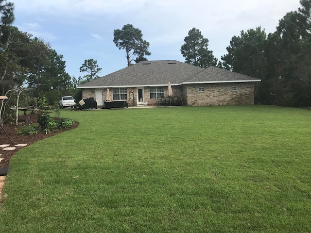 view of front of house featuring a front yard