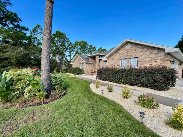 view of front of home featuring a front lawn