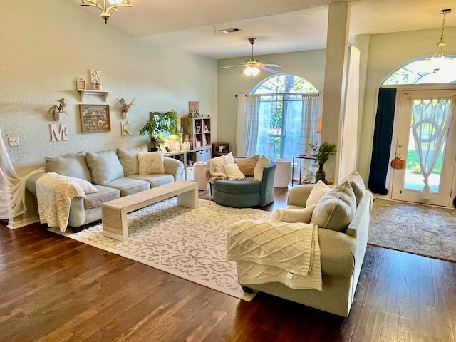 living room with ceiling fan, dark hardwood / wood-style floors, and a healthy amount of sunlight