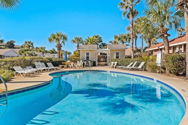 view of swimming pool featuring a patio