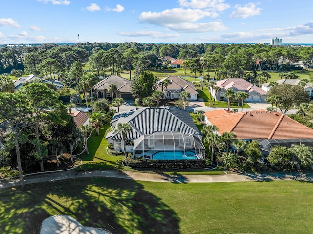 birds eye view of property with a residential view