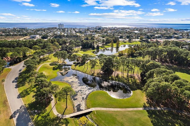 bird's eye view featuring a water view and golf course view