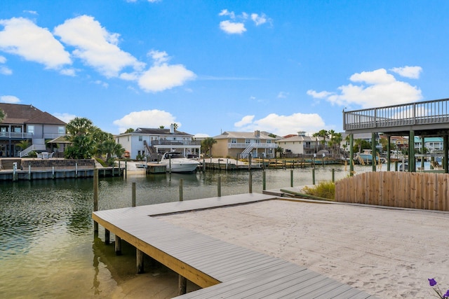 dock area with a water view