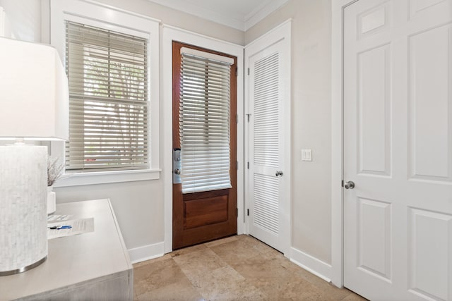 doorway featuring ornamental molding