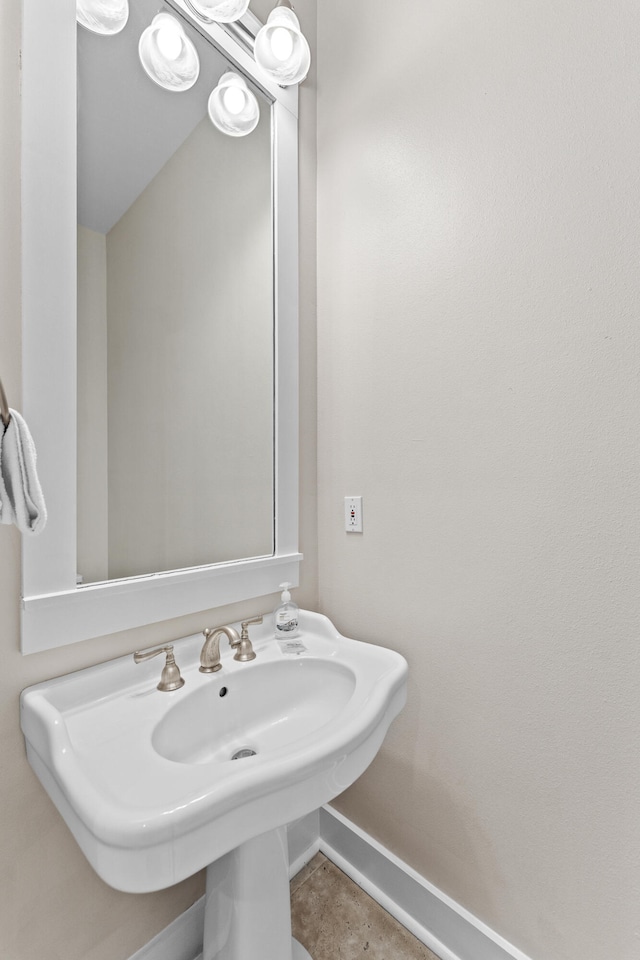 bathroom featuring tile patterned floors and sink