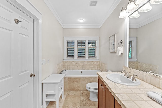 bathroom with tiled bath, crown molding, vanity, and toilet