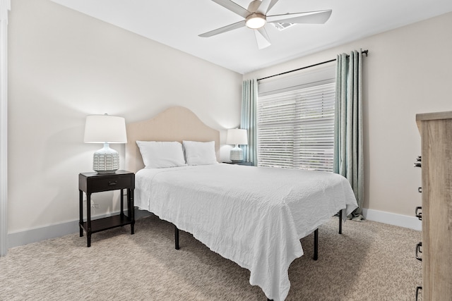 bedroom featuring ceiling fan and carpet floors