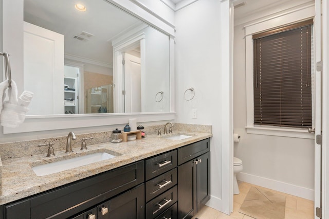 bathroom featuring toilet, walk in shower, vanity, ornamental molding, and tile patterned flooring