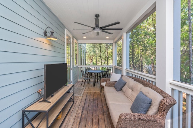 exterior space featuring ceiling fan