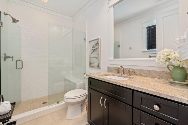 bathroom with toilet, ornamental molding, vanity, an enclosed shower, and tile patterned floors