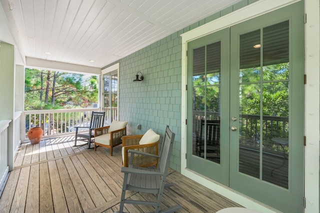 wooden terrace with a porch