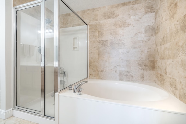 bathroom featuring separate shower and tub and tile patterned flooring