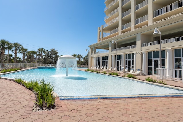 view of pool featuring pool water feature