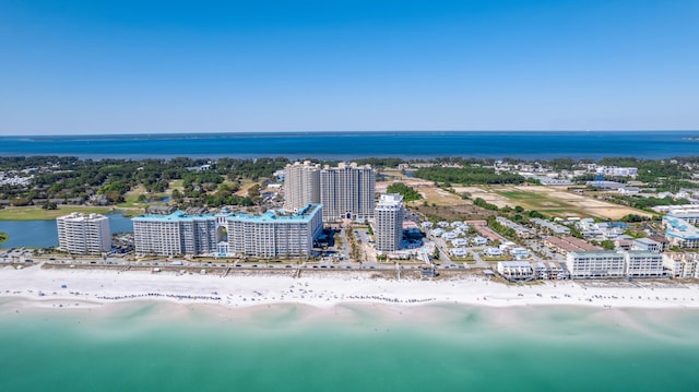 bird's eye view with a water view and a view of the beach