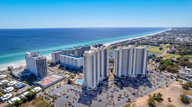 bird's eye view featuring a water view and a view of the beach