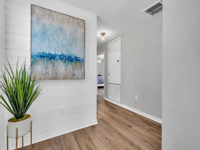 hallway featuring light wood-type flooring