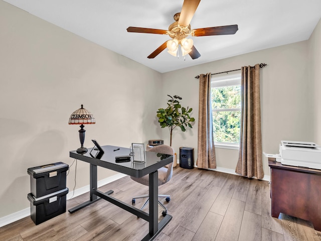 office area featuring light wood-type flooring and ceiling fan