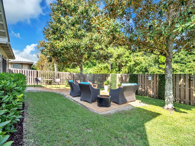 view of yard featuring a patio area and an outdoor hangout area