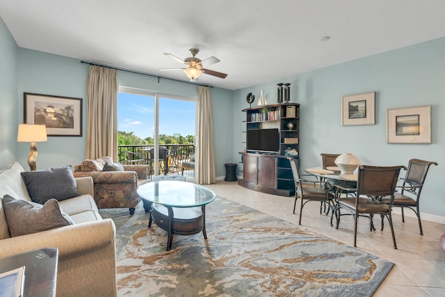 living room with ceiling fan and light tile patterned floors