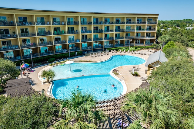 view of swimming pool featuring a patio area