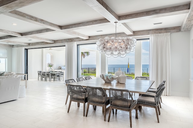 tiled dining room with a water view, coffered ceiling, beam ceiling, and an inviting chandelier