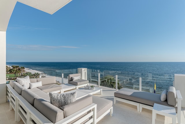 view of patio / terrace featuring an outdoor living space and a water view