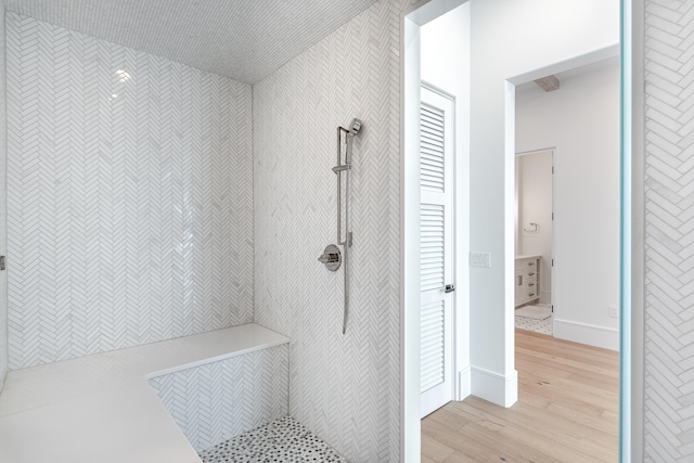 bathroom with wood-type flooring