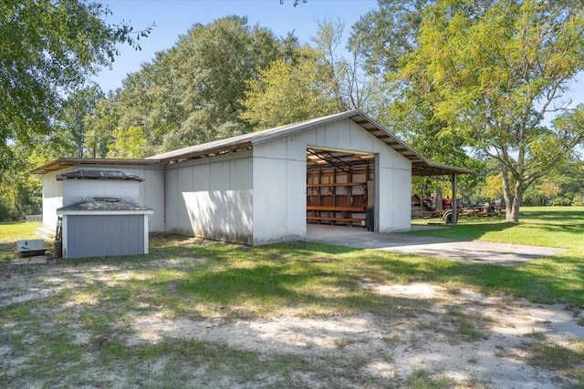 garage with a lawn