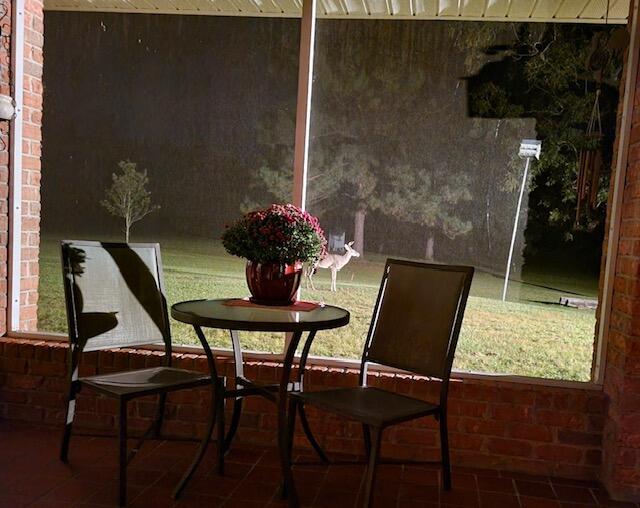 dining space featuring tile patterned flooring