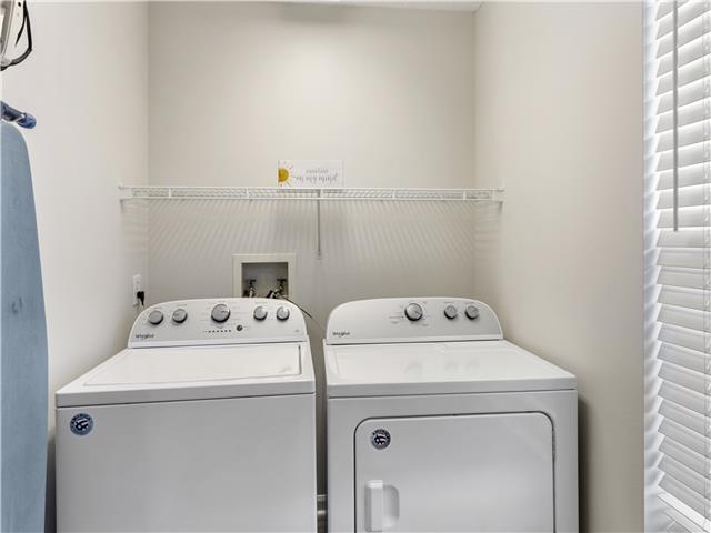 2076 Scenic Gulf Dr Unit 1013, Miramar Beach, FL 32550 - laundry area featuring independent washer and dryer