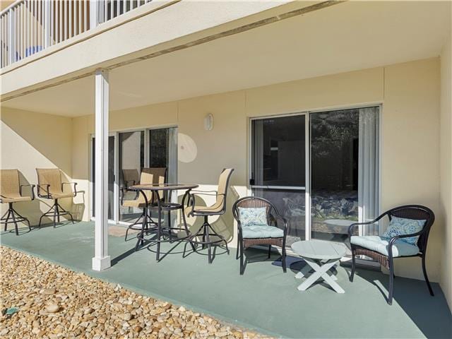 2076 Scenic Gulf Dr Unit 1013, Miramar Beach, FL 32550 - view of patio / terrace with a balcony