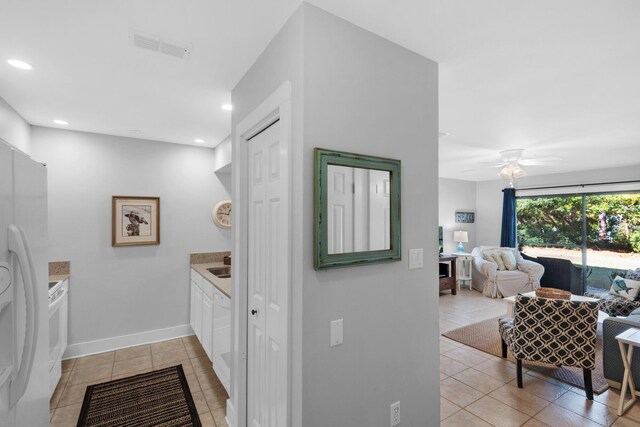 59 N Myrtle Dr Unit 207, Santa Rosa Beach, FL 32459 - laundry area featuring light tile patterned floors, ceiling fan, baseboards, washer / dryer, and recessed lighting
