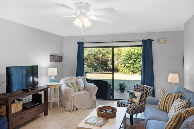 tiled living room with ceiling fan