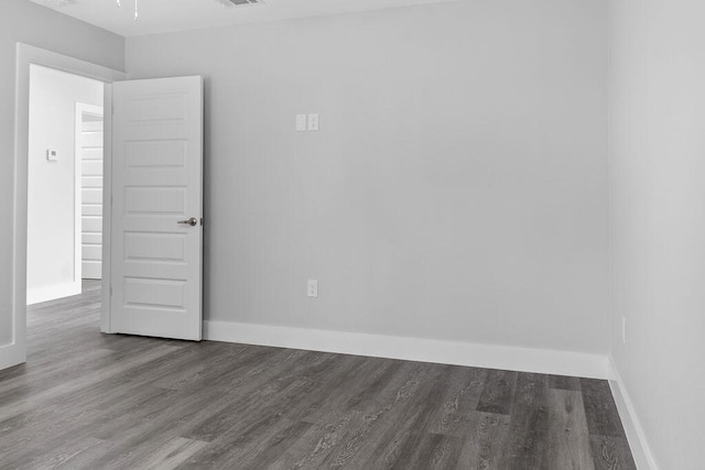 empty room featuring hardwood / wood-style floors