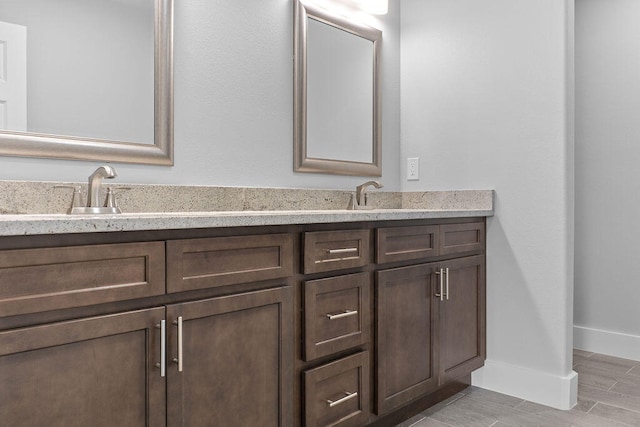 bathroom with wood-type flooring and vanity