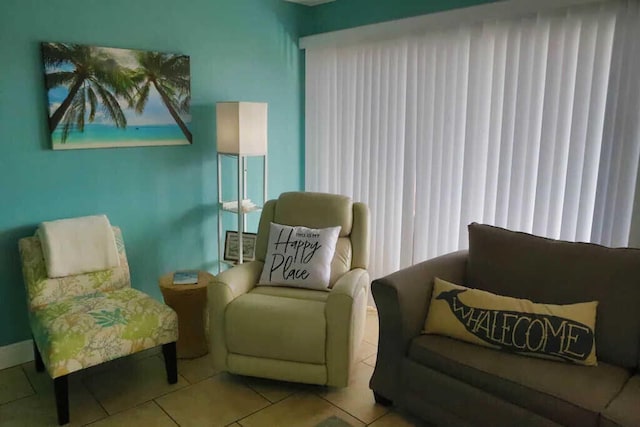 living area with light tile patterned flooring