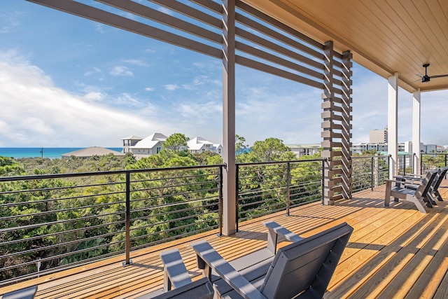 wooden terrace with a water view