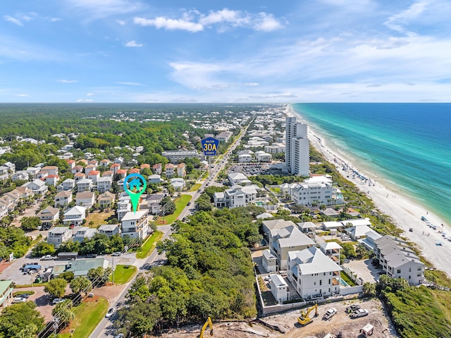 bird's eye view with a water view and a view of the beach