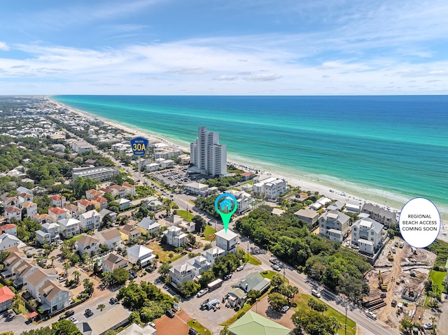 aerial view featuring a water view and a view of the beach