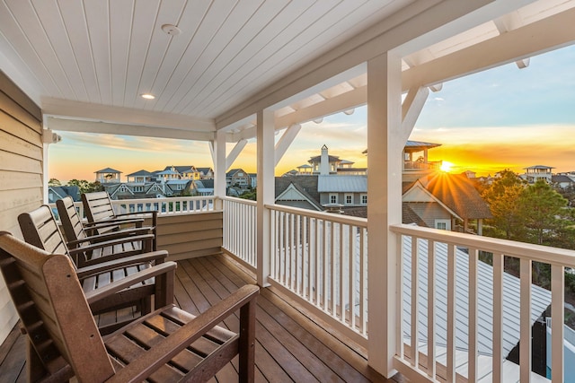 view of balcony at dusk