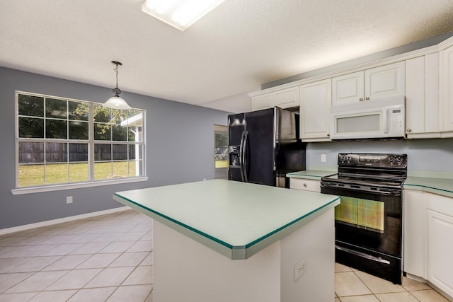 kitchen with light tile patterned flooring, black appliances, hanging light fixtures, and white cabinets