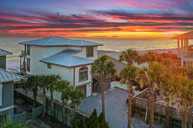 exterior space with a water view