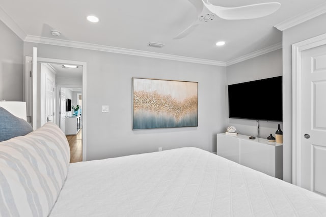 bedroom featuring ceiling fan and ornamental molding