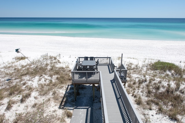 view of home's community featuring a view of the beach and a water view