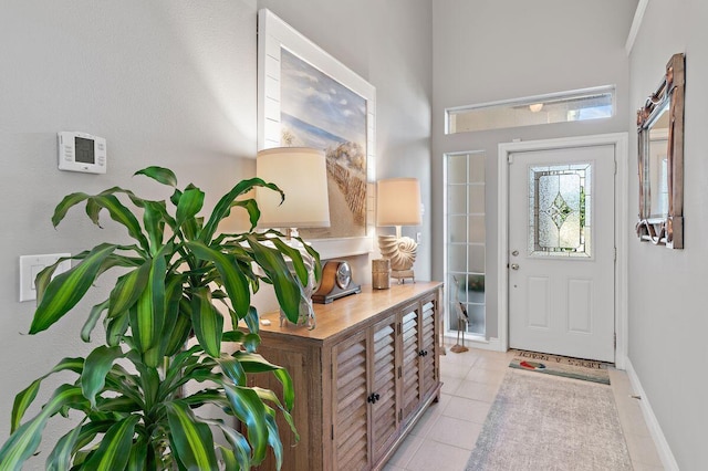 entrance foyer with light tile patterned floors