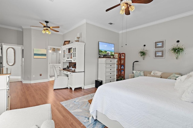 bedroom featuring ornamental molding, hardwood / wood-style flooring, and ceiling fan