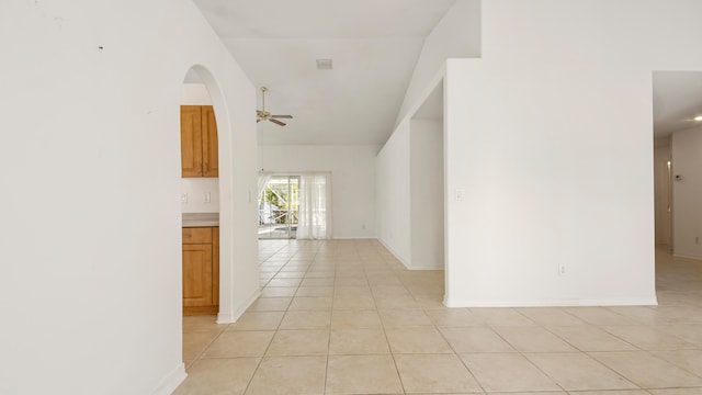 corridor featuring light tile patterned flooring