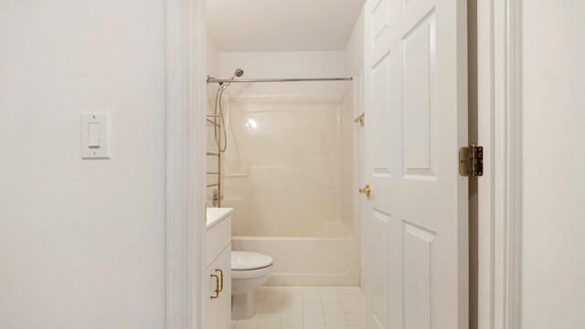 full bathroom with tile patterned floors, vanity, washtub / shower combination, and toilet