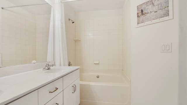 bathroom with shower / bath combo with shower curtain and vanity