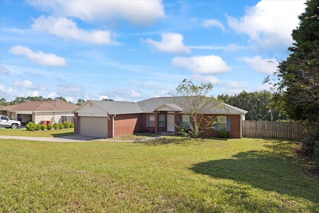 single story home featuring a front yard and a garage